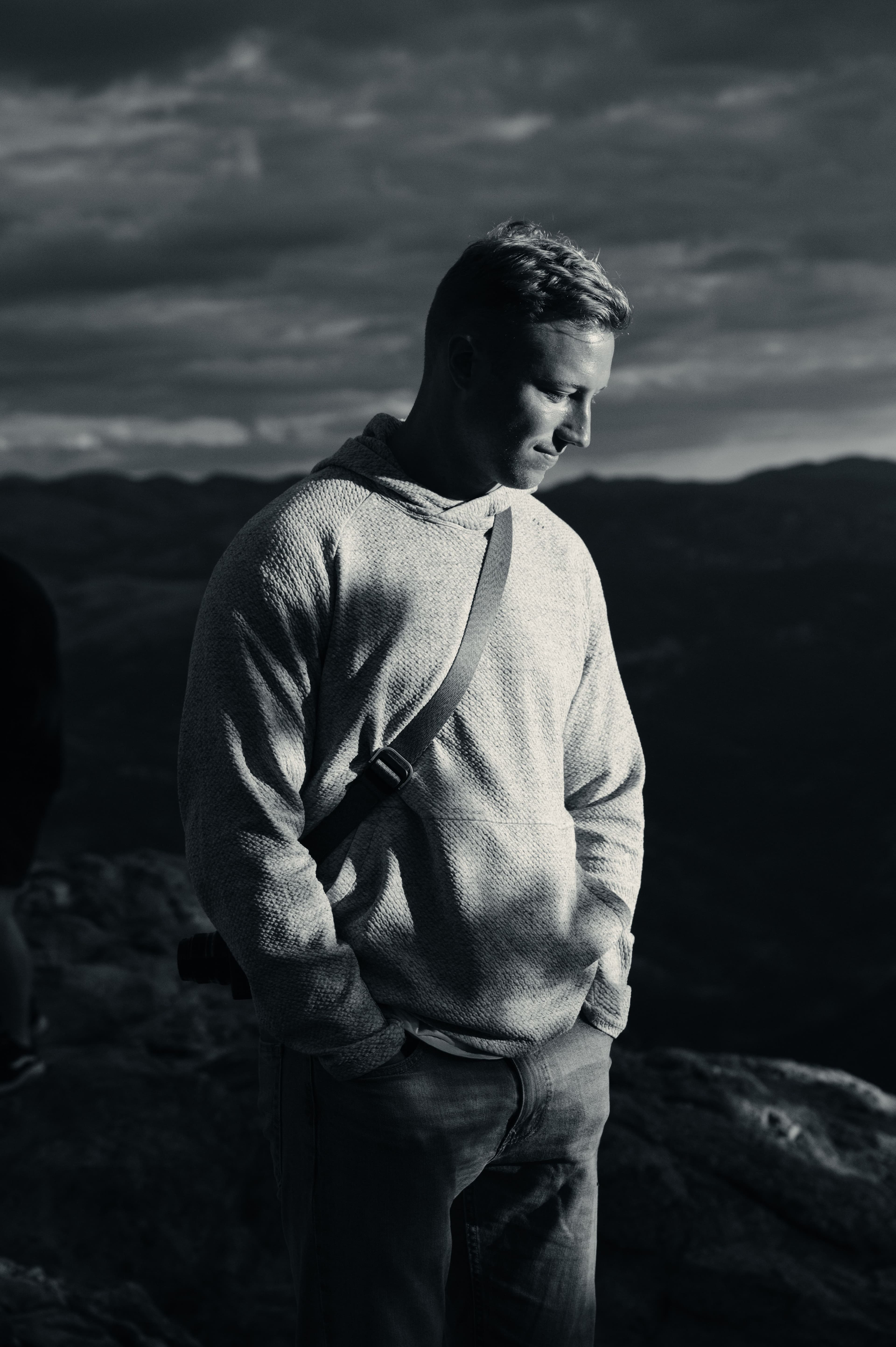 Kevan Sovay with a cross body camera strap