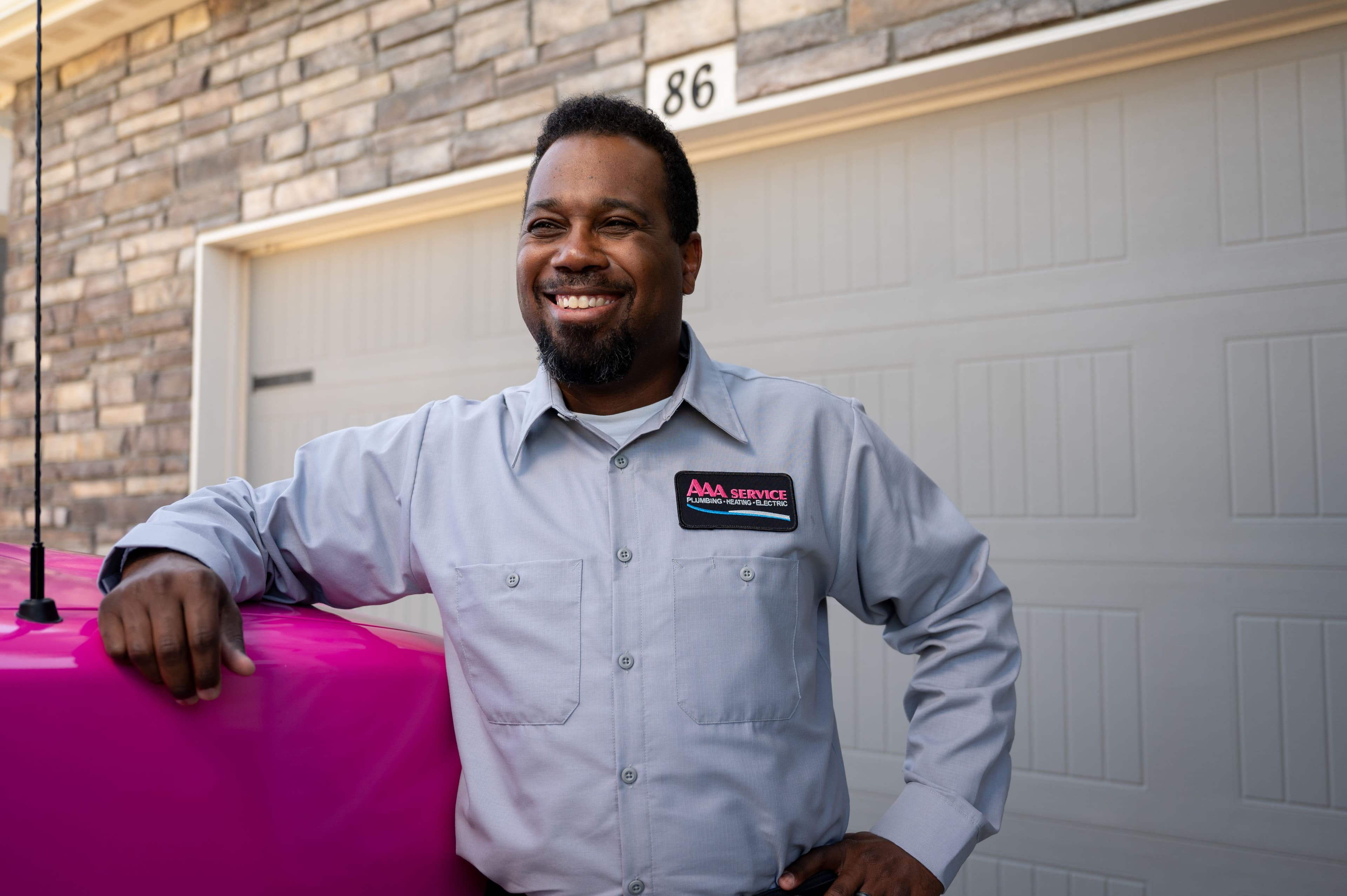 Service technician by pink van