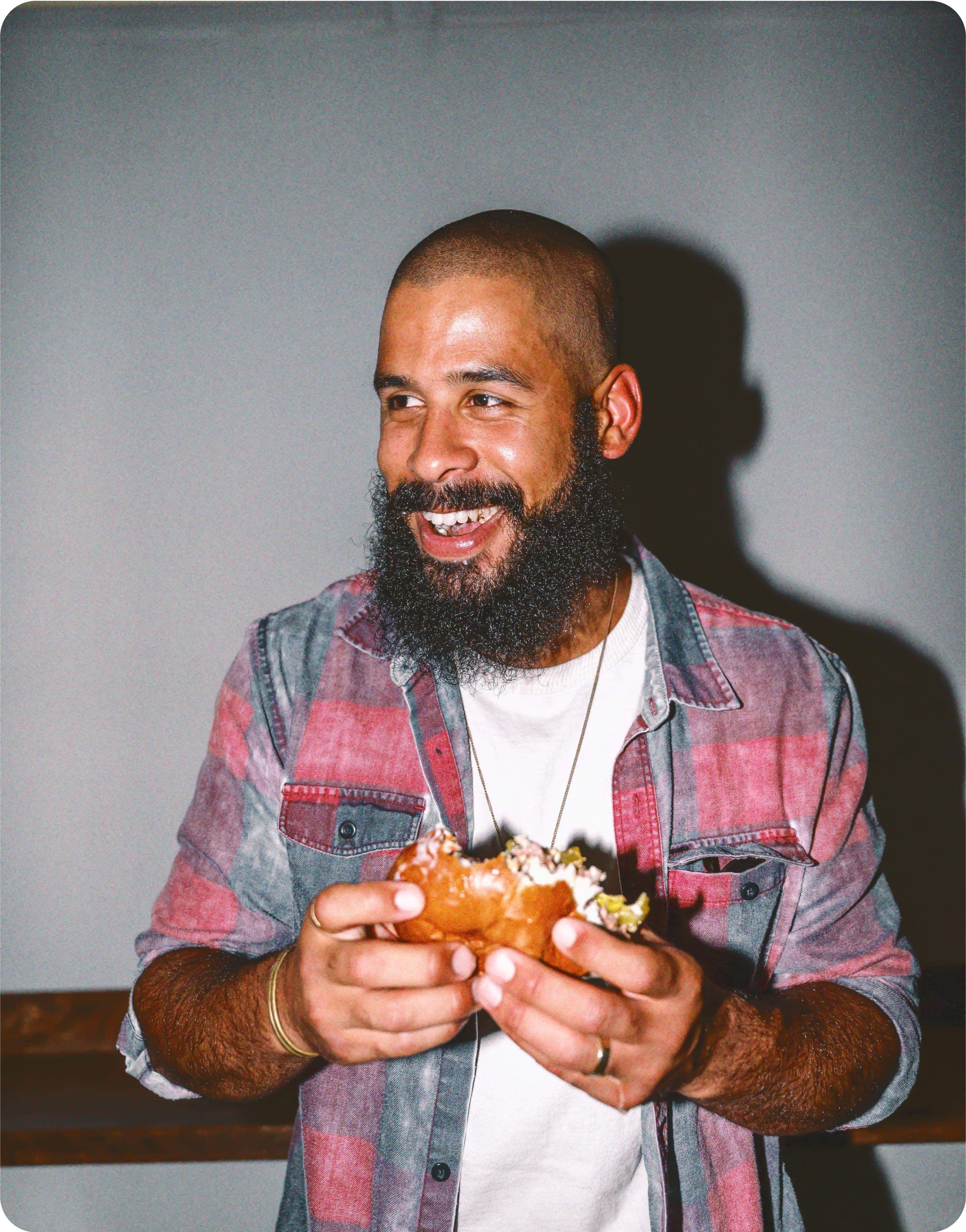 man eating a burger